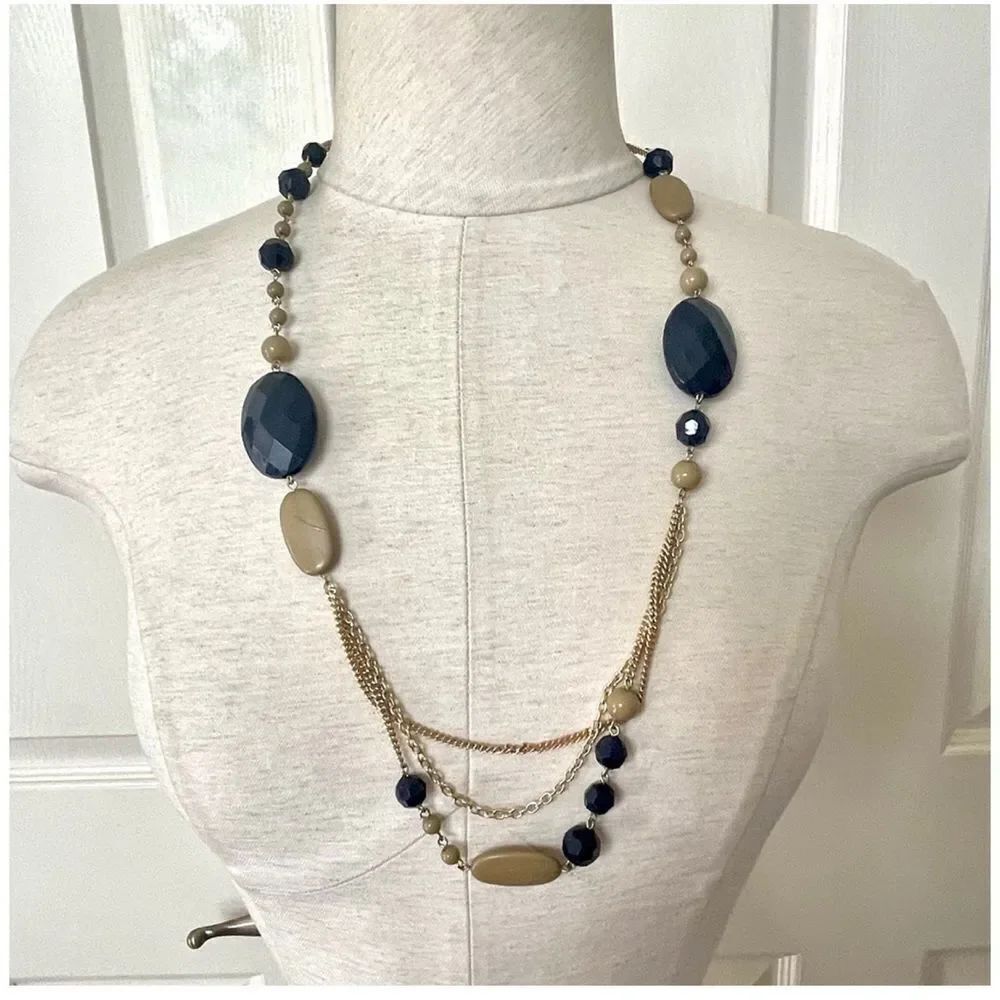 Navy and gold tone beaded statement necklace